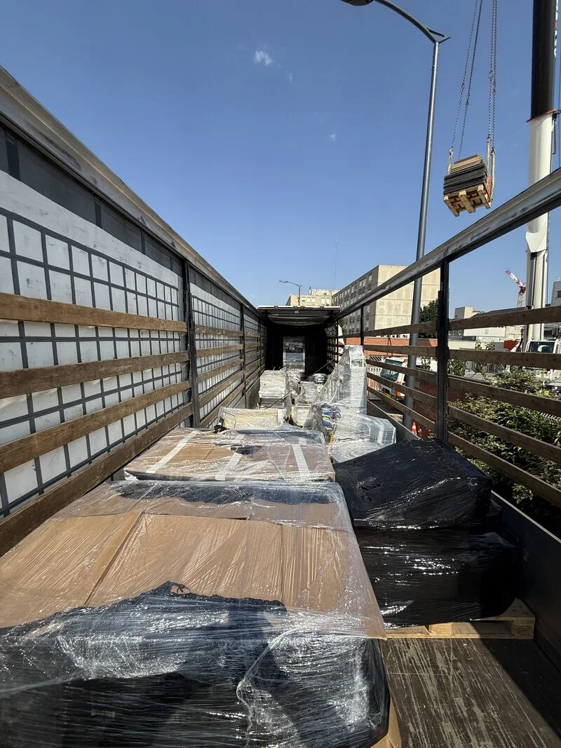 Wrapped equipment components placed in the transport truck — Bobigny – IRHE