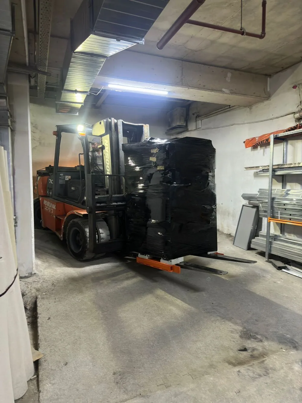 Forklift moving a wrapped component — Medical Park Gebze Hospital, Kocaeli, Turkey