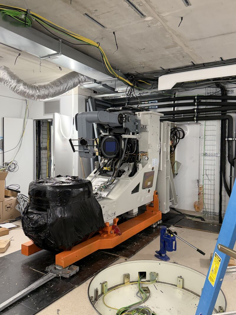 Partly wrapped LINAC on an orange transport frame — Argenteuil
