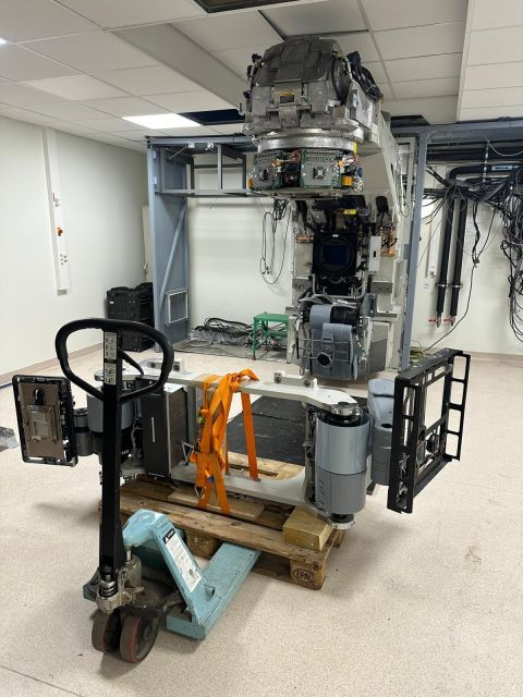 Partly wrapped LINAC on an orange transport frame — Argenteuil