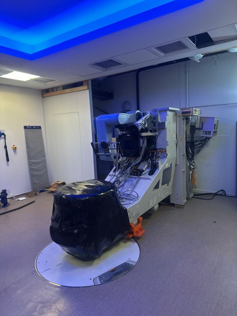 Partly wrapped LINAC on an orange transport frame — Carcassonne