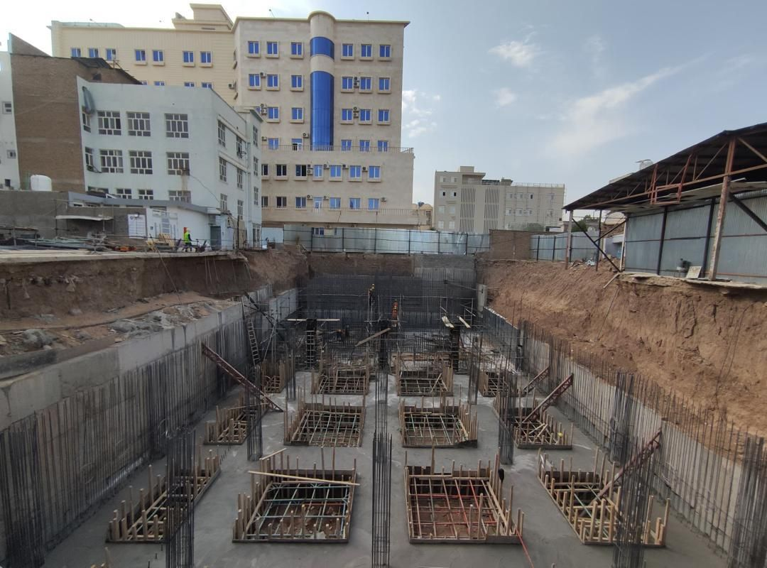 Foundation and formwork in front of the hospital building — Central Asia