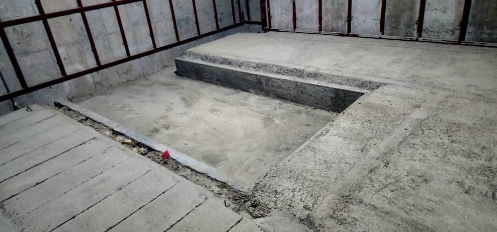 Rectangular equipment mounting pit in the concrete room — Central Asia
