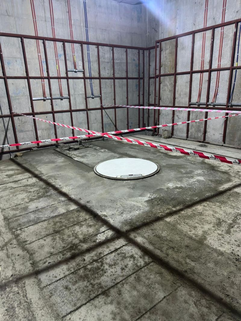 Covered circular equipment mounting point in the concrete floor — Central Asia