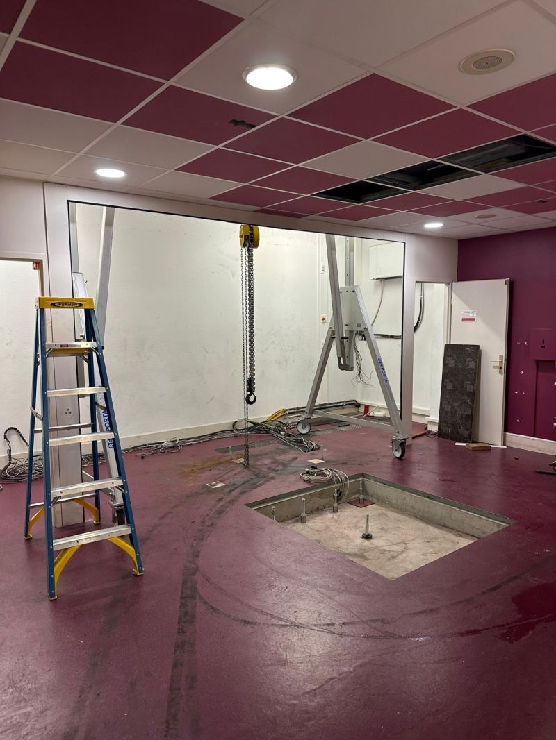Open equipment mounting pit in the empty treatment room — Dijon