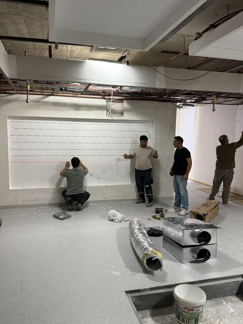 Team working on the room’s wall panels — Gaziantep