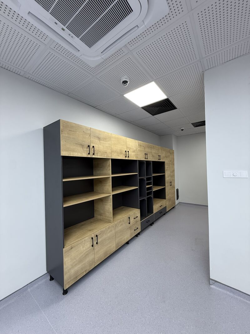 Wood-finished cabinets and open shelving in the room — Rize