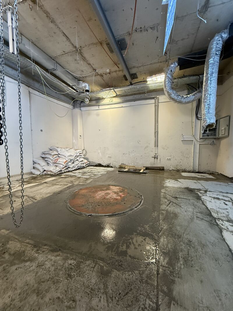 Concrete floor around the circular equipment base — Rize