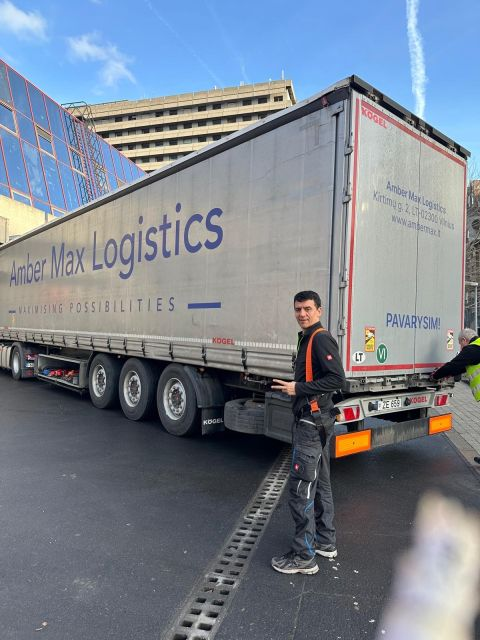 Transport truck and loading area outside the hospital — Saint-Luc